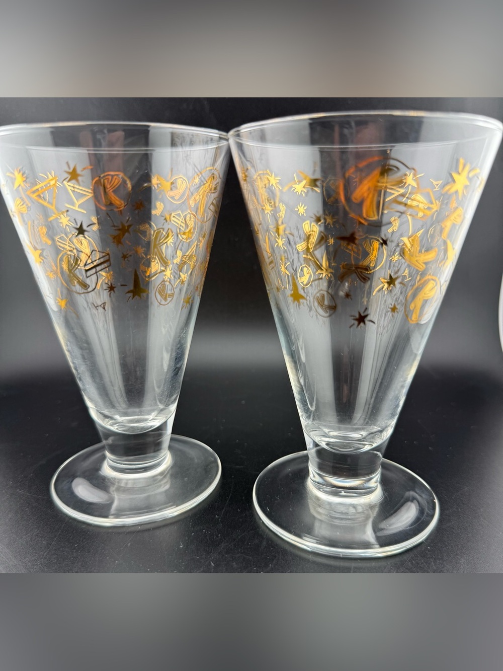 2 Kahlúa footed cocktail/mudslie glasses gold "K", stars, & rockets. 9oz
